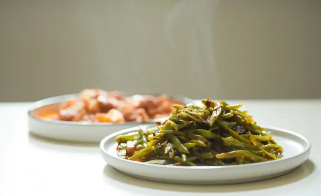 Green beans in tomato (green beans in tomato), Greek catering, illustrative photo
