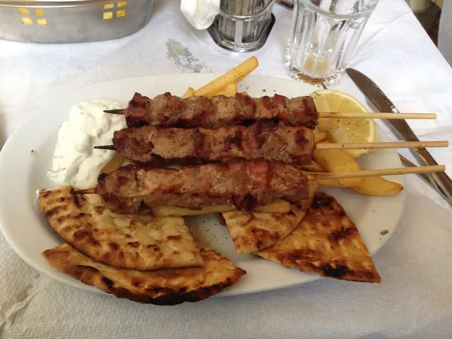 Souvlaki (skewers), Greek catering, illustrative photo